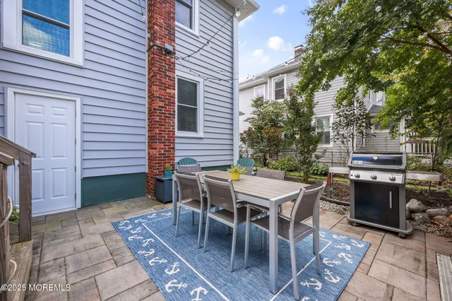 a view of a garden with a patio