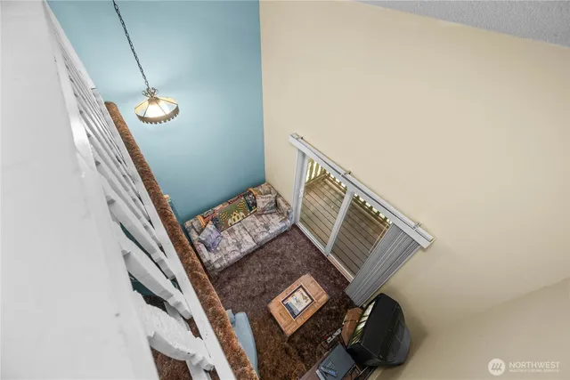 a view of balcony with wooden floor