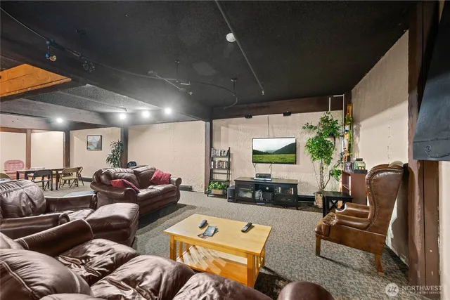 a view of a kitchen with sink washer and dryer