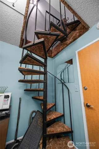 a bedroom with furniture and a chandelier