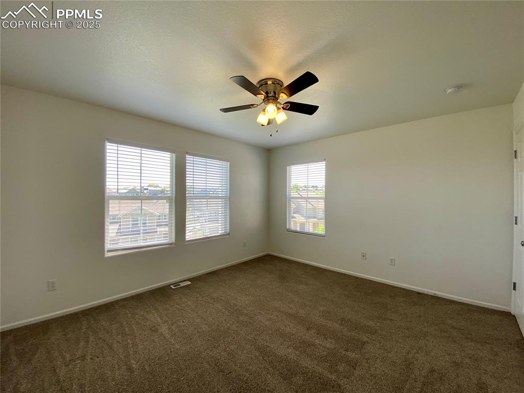 7513 Sandy Springs Point Fountain, CO 80817 - Photo 23 of 38 a view of an empty room with a window
