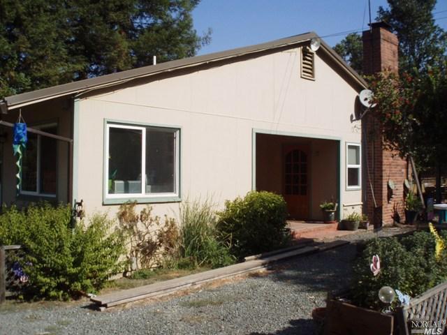 8200 Old River Road Ukiah, CA 95482 - Photo 1 of 1 Nice covered entry at the front door. The exterior of the home is Hardi-panel siding and home has a lifetime metal roof.