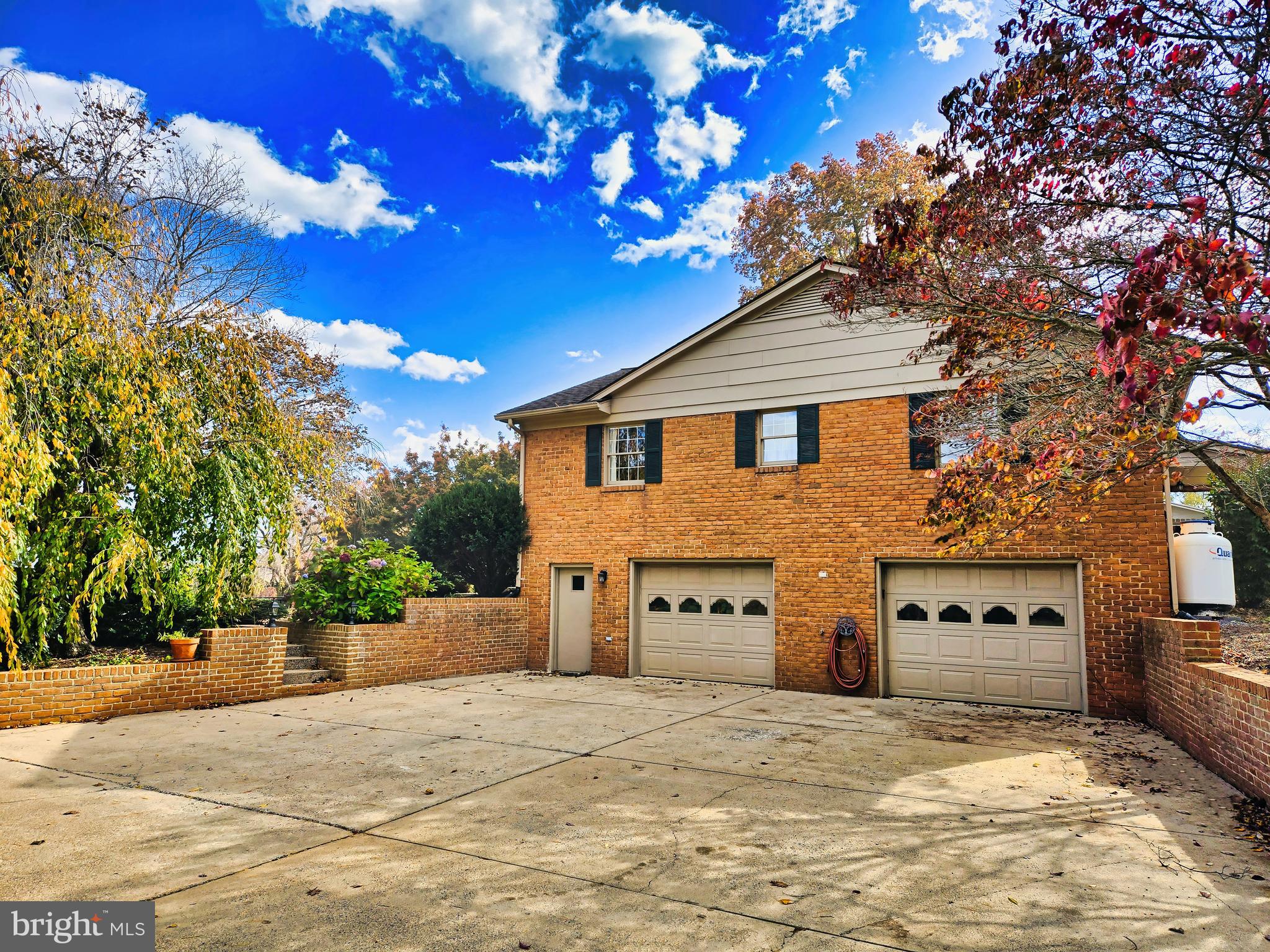 174 Rorrer Circle Harrisonburg, VA 22801 - Photo 2 of 52 a front view of a house with a yard and garage