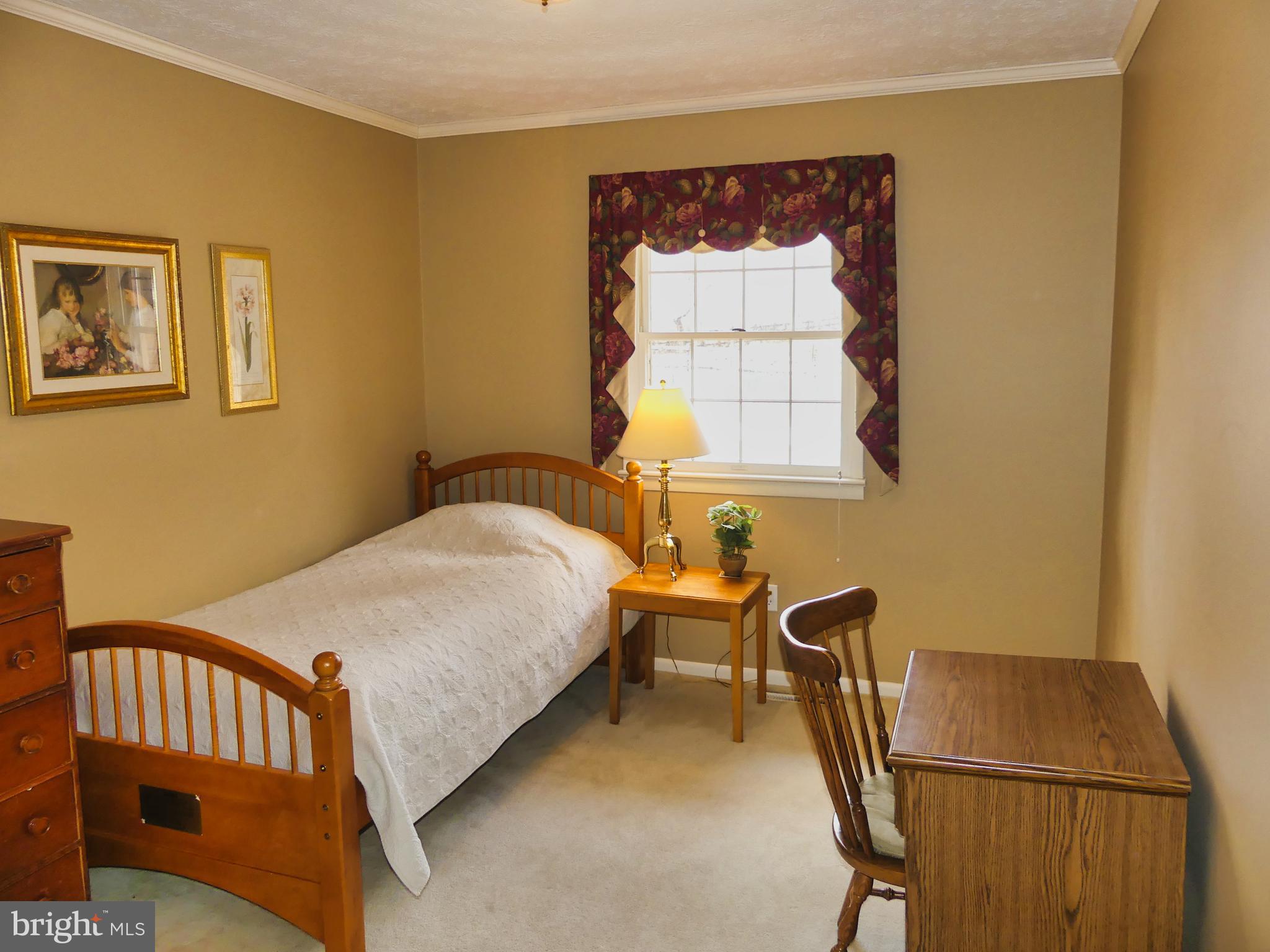 174 Rorrer Circle Harrisonburg, VA 22801 - Photo 35 of 52 a bedroom with a bed and a window