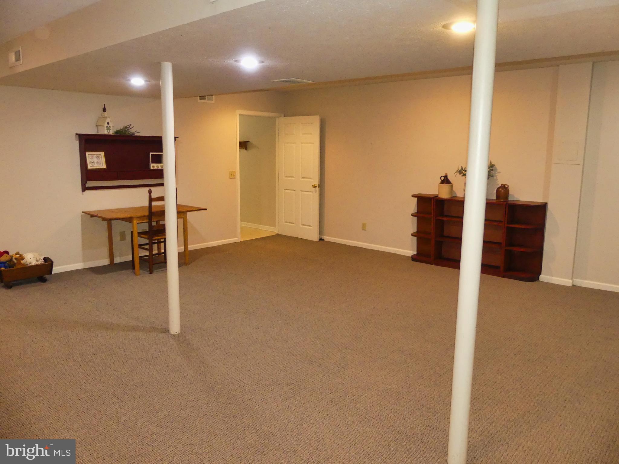 174 Rorrer Circle Harrisonburg, VA 22801 - Photo 44 of 52 an empty room with furniture and a flat screen tv