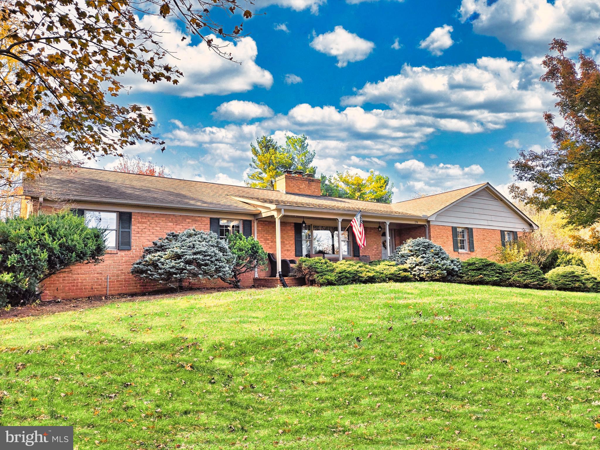 174 Rorrer Circle Harrisonburg, VA 22801 - Photo 52 of 52 a view of a yard in front of a house with plants and large tree