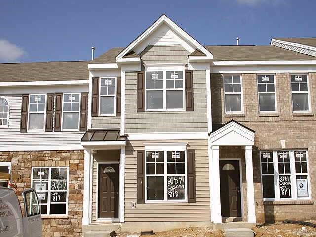 2959 Casona Way Raleigh, NC 27616 - Photo 1 of 1 a front view of a residential apartment building with a yard