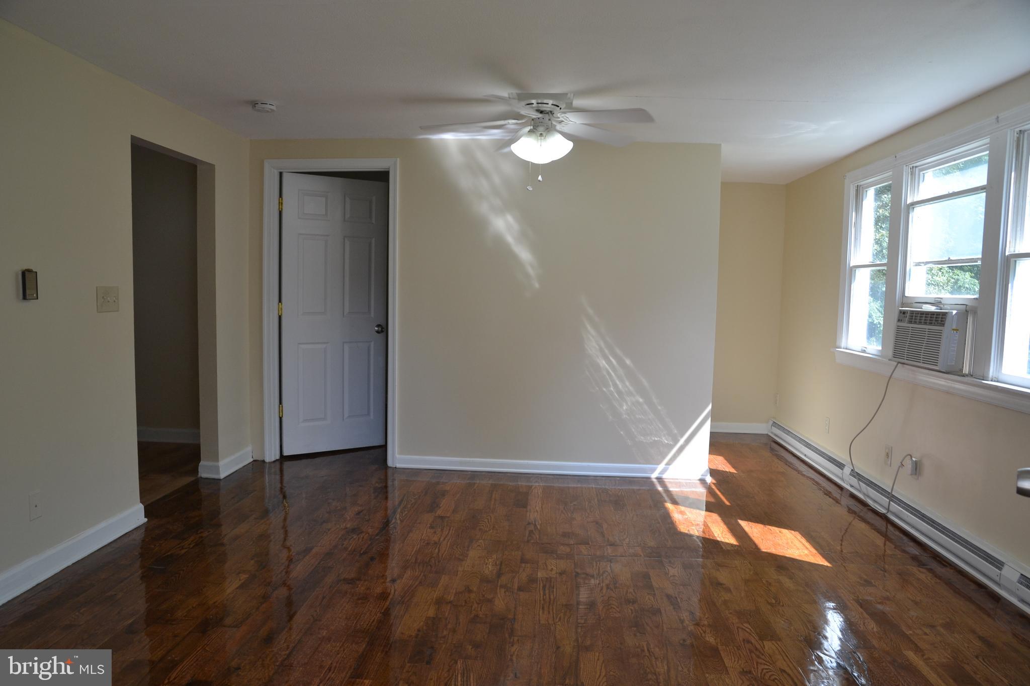 20111 Triangle Road Barhamsville, VA 23011 - Photo 14 of 20 #2 Family room with refinished hardwood floors.