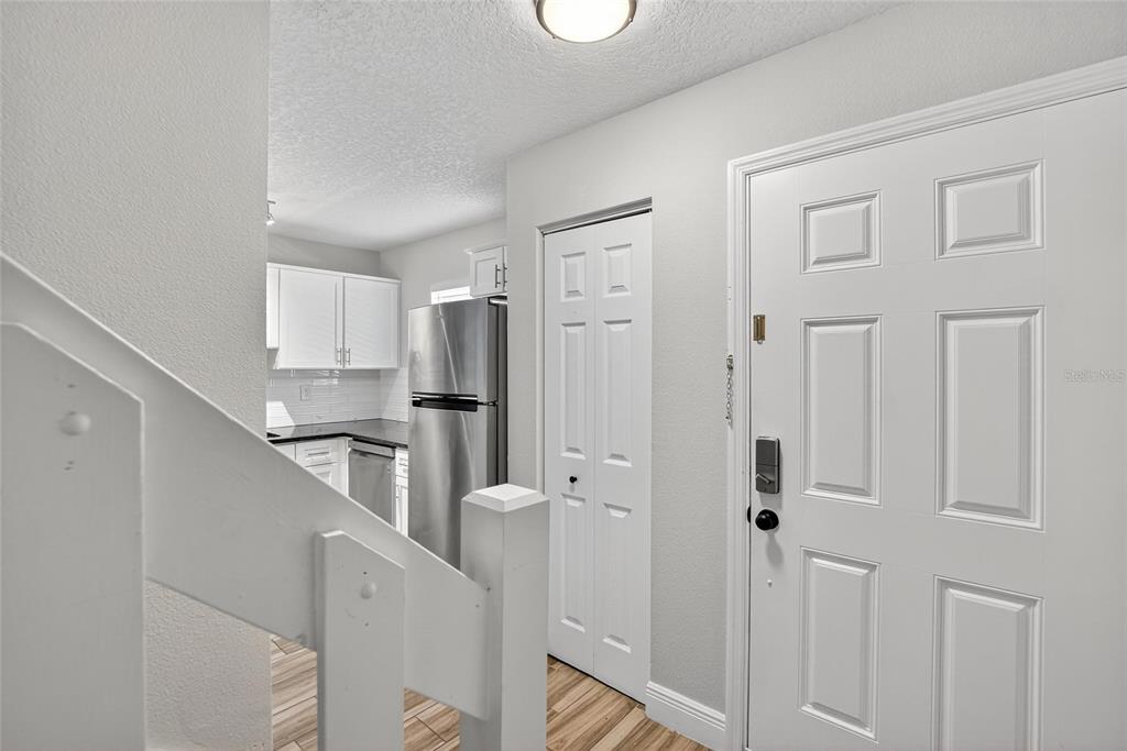 4415 Dylan Loop, Unit 179 Land O' Lakes, FL 34639 - Photo 12 of 50 a kitchen with cabinets and stainless steel appliances