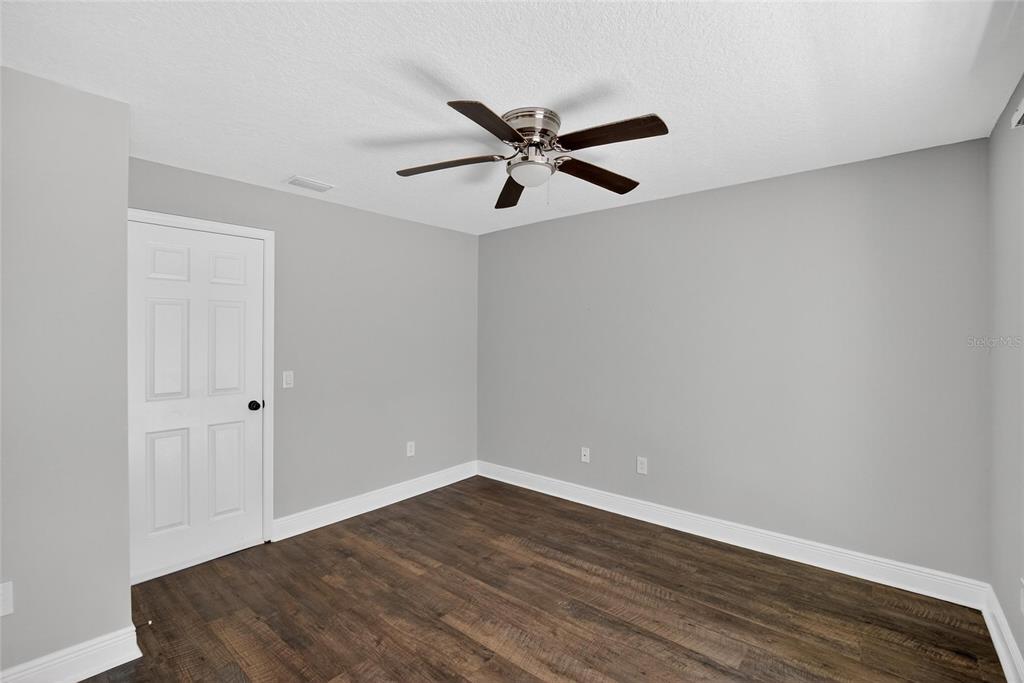 4415 Dylan Loop, Unit 179 Land O' Lakes, FL 34639 - Photo 28 of 50 a view of a room with wooden floor