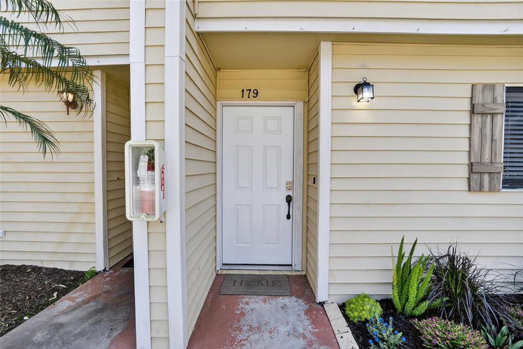 4415 Dylan Loop, Unit 179 Land O' Lakes, FL 34639 - Photo 5 of 50 a view of front door and porch