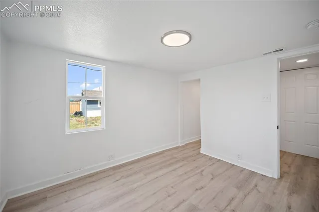 a view of a backyard with sitting area