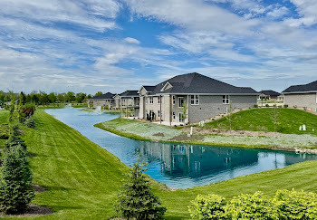 15959 Prairie View, Unit T6 Lockport, IL 60441 - Photo 23 of 27 a view of a house with a yard and lake view