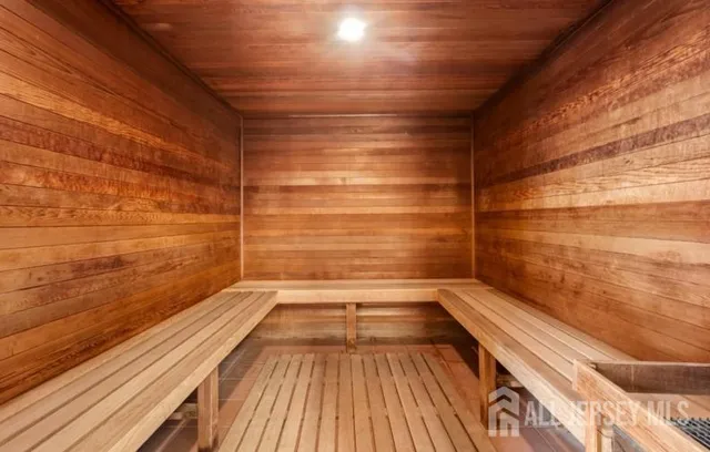 a bathroom with a bathtub and shower