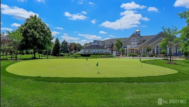 a view of an house with a garden