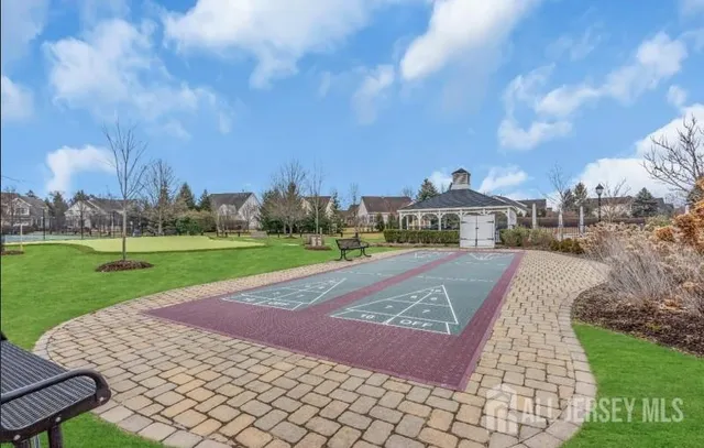 a view of a park with large trees