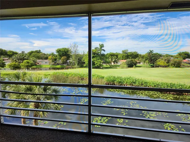 a view of outdoor space with a lake view