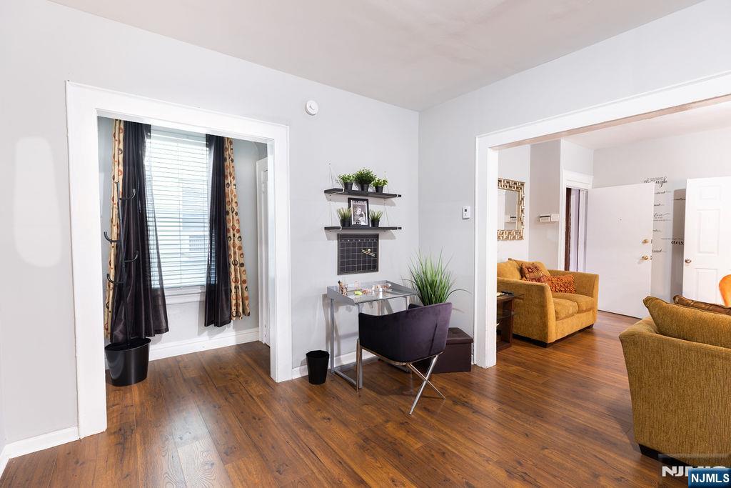 40-42 Harding Terrace Newark, NJ 07112 - Photo 5 of 15 a living room with furniture and wooden floor