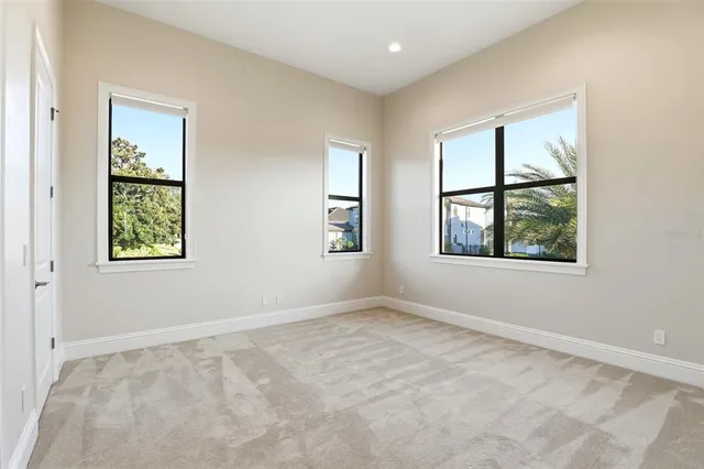 an empty room with windows