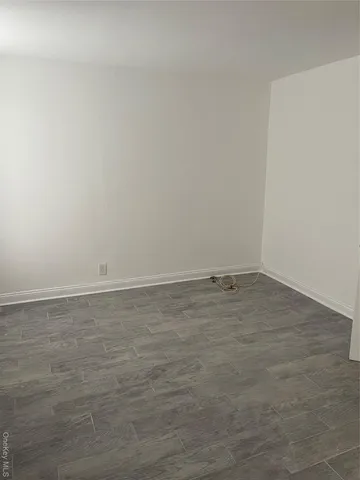 a view of a room with an empty space
