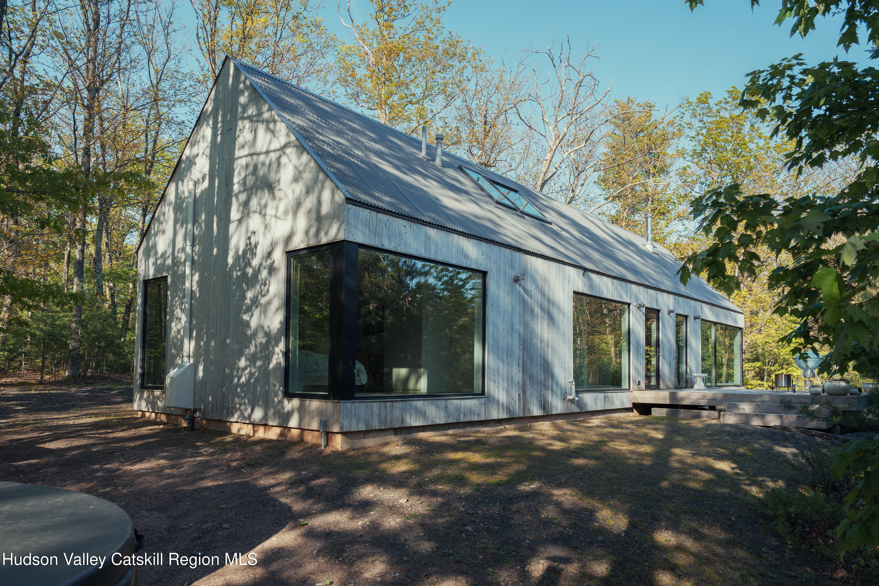 261 Blackhead Mountain Road Round Top, NY 12473 - Photo 33 of 40 a view of a house with a yard