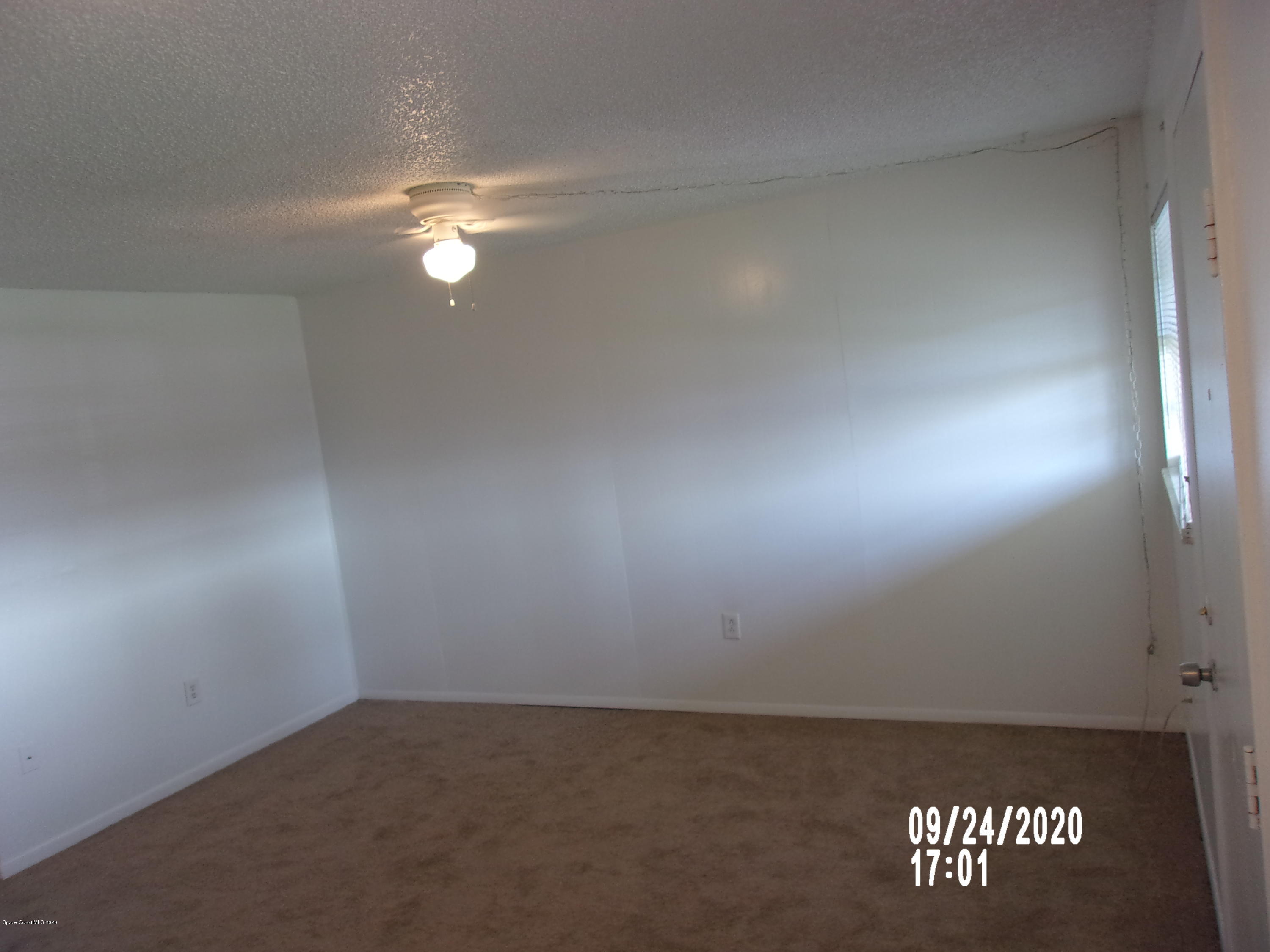 1713 Dixon Boulevard, Unit 156 Cocoa, FL 32922 - Photo 3 of 12 a view of an empty room