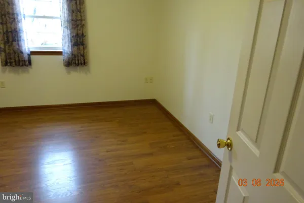 a bathroom with a shower and toilet