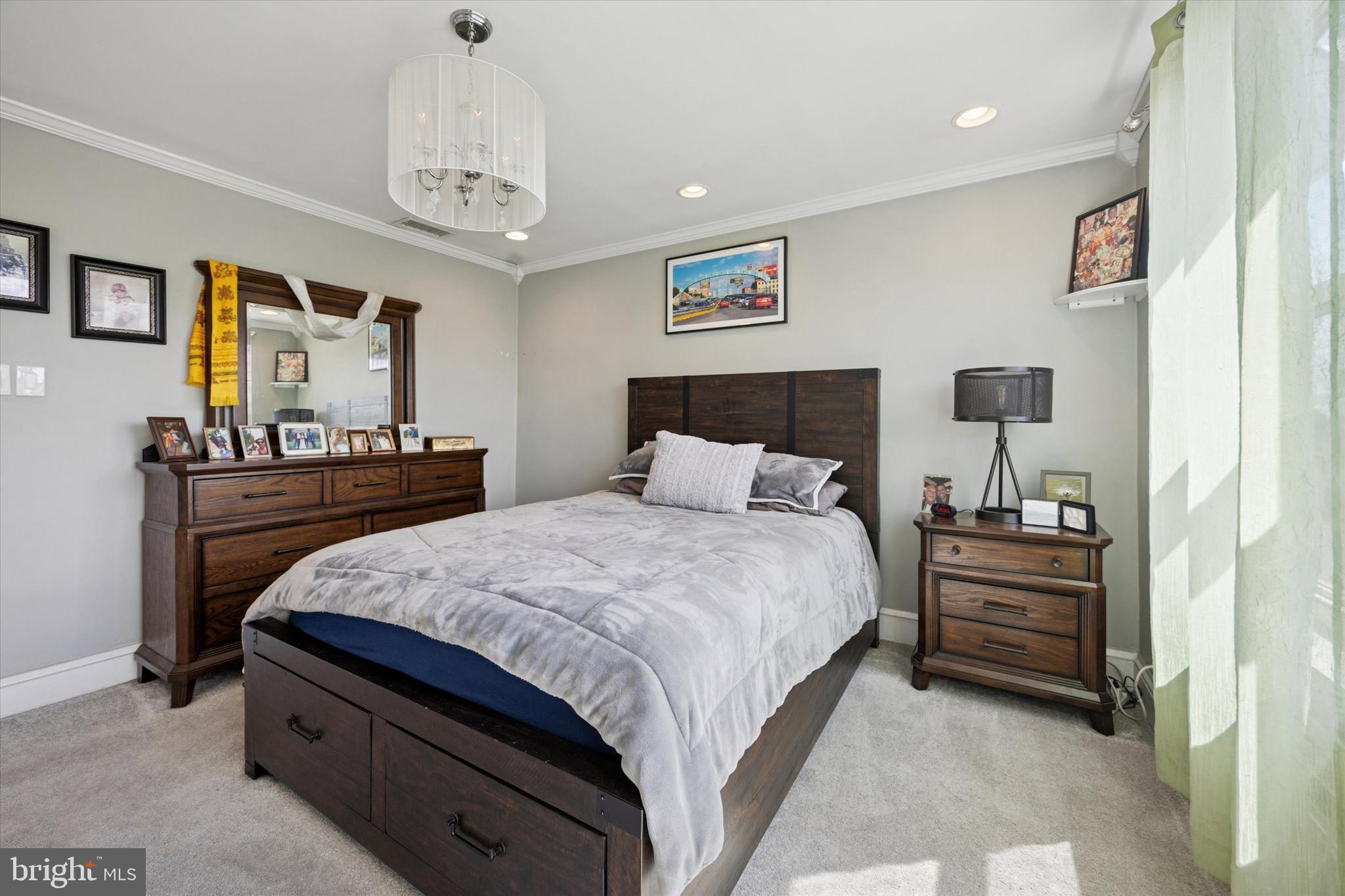 2935 South 13th Street Philadelphia, PA 19148 - Photo 12 of 24 a bedroom with bed and window