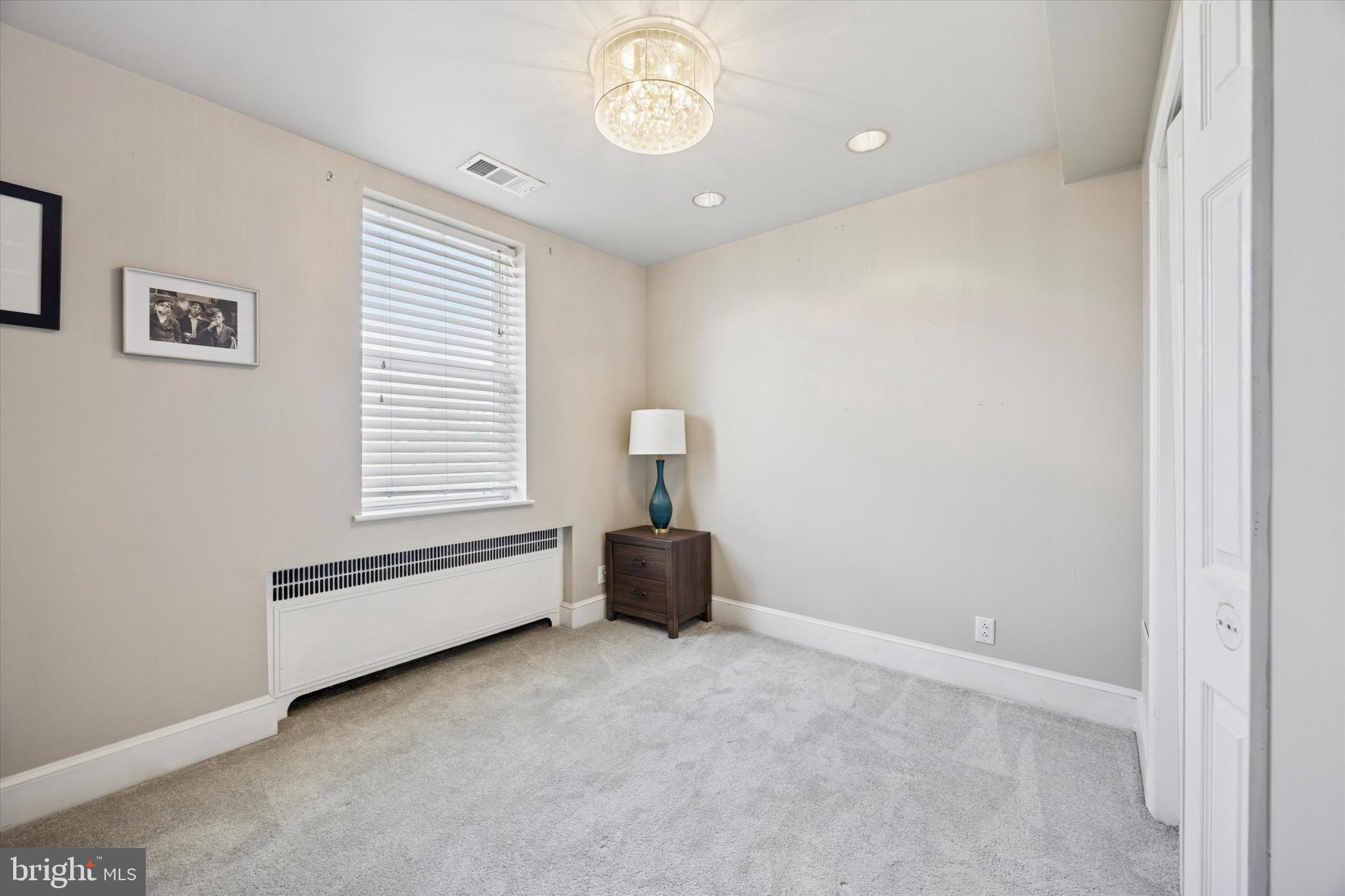 2935 South 13th Street Philadelphia, PA 19148 - Photo 15 of 24 a living room with furniture and a window