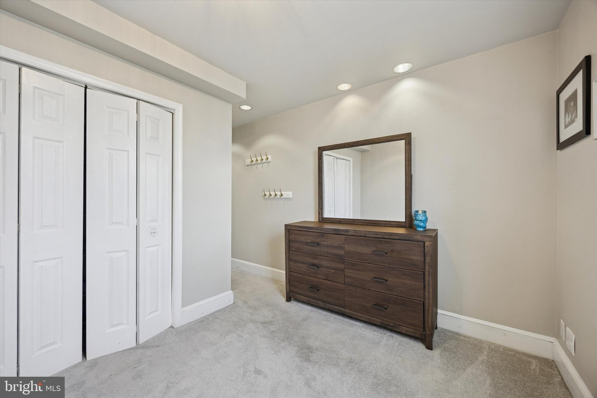 2935 South 13th Street Philadelphia, PA 19148 - Photo 16 of 24 a room with a cabinet and a window