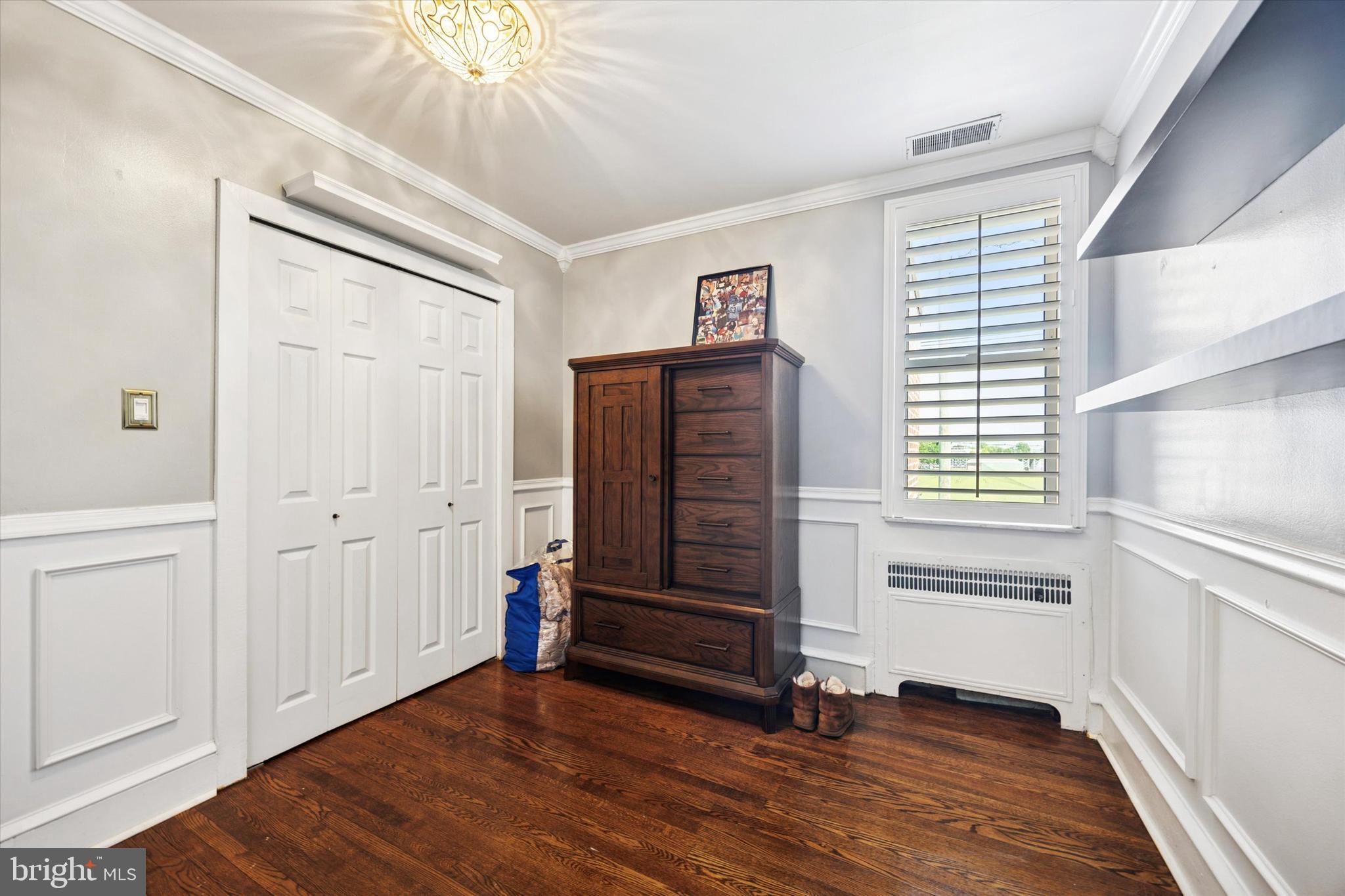 2935 South 13th Street Philadelphia, PA 19148 - Photo 19 of 24 a view of an empty room with wooden floor and a window