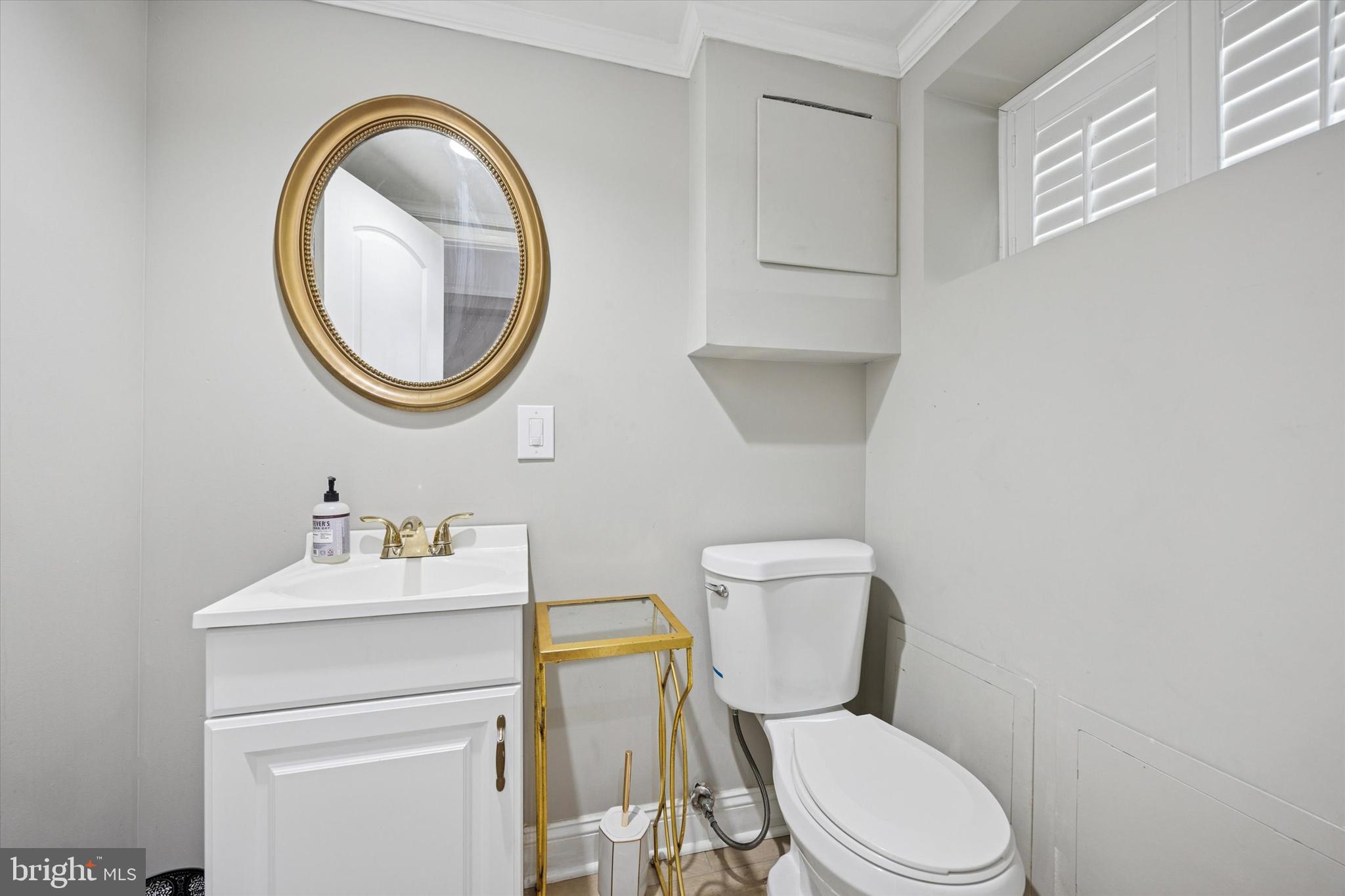 2935 South 13th Street Philadelphia, PA 19148 - Photo 21 of 24 a white toilet sitting next to a bathroom sink