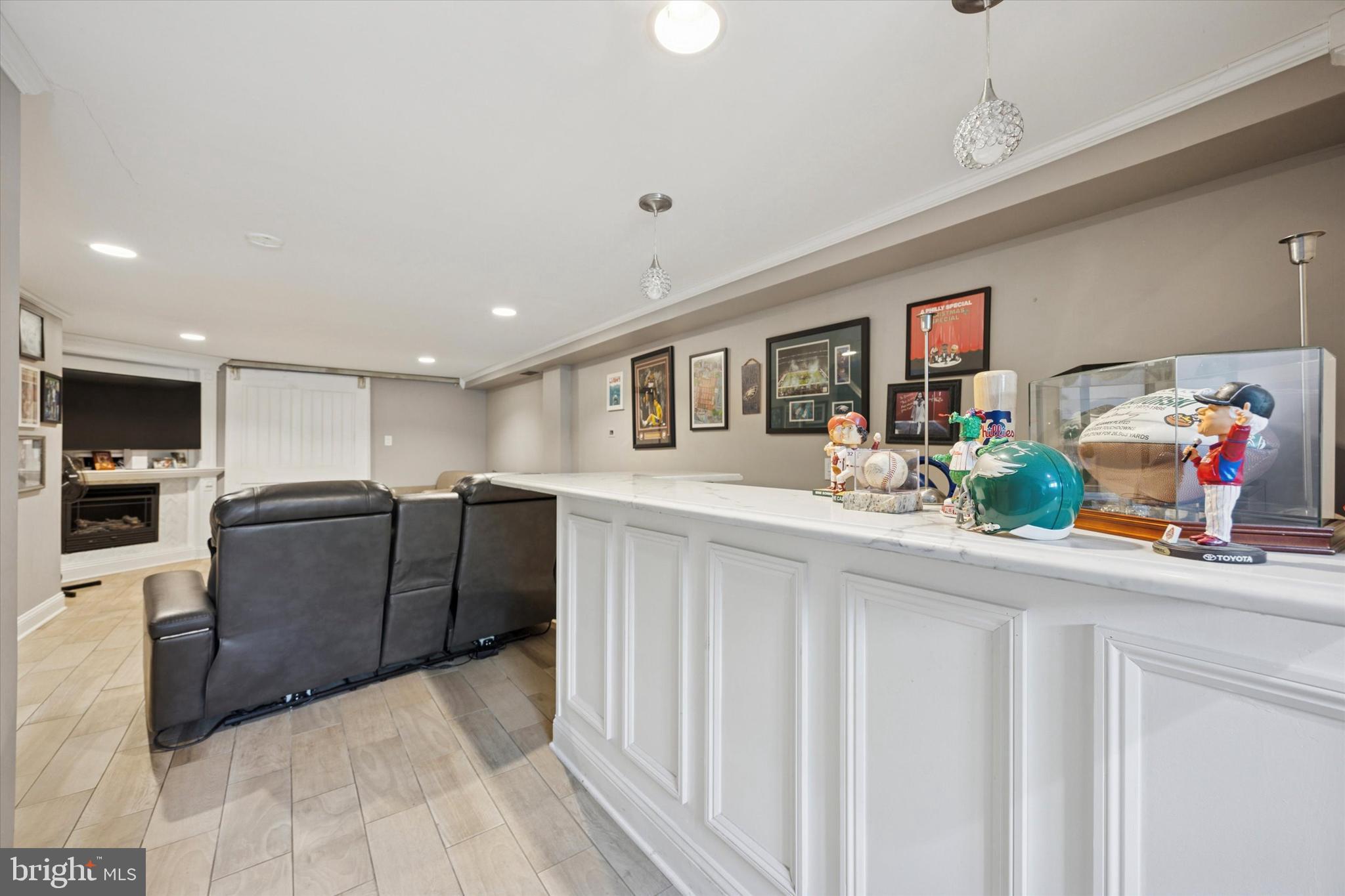 2935 South 13th Street Philadelphia, PA 19148 - Photo 10 of 24 a kitchen with stainless steel appliances granite countertop a refrigerator and a sink