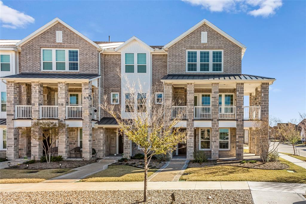 3700 Pelican Rst Way Arlington, TX 76005 - Photo 1 of 1 View of property featuring a standing seam roof, a balcony, and stone siding