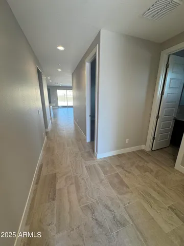 an empty room with a mirror