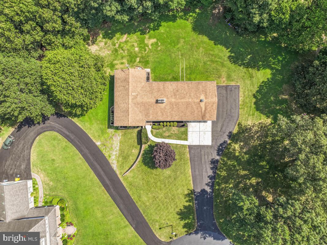 626 Fairmount Road Linthicum Heights, MD 21090 - Photo 2 of 58 an aerial view of a house with swimming pool and large trees