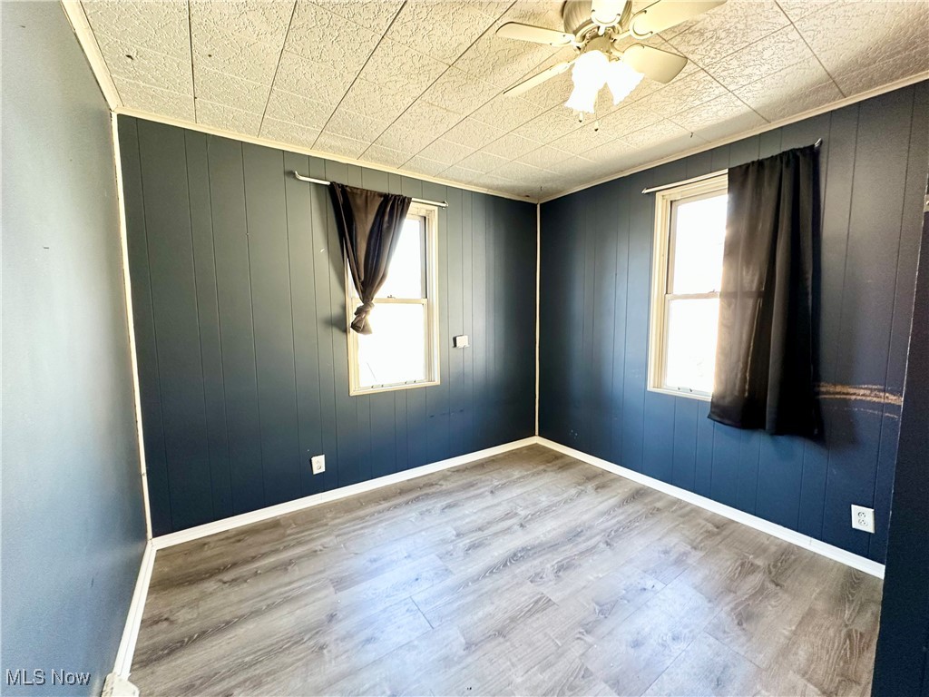 87 R 26th Street Wellsburg, WV 26070 - Photo 10 of 17 Bedroom featuring a ceiling fan