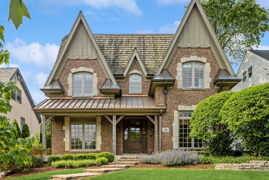 218 Ravine Road Hinsdale, IL 60521 - Photo 1 of 1 a front view of a house with garden