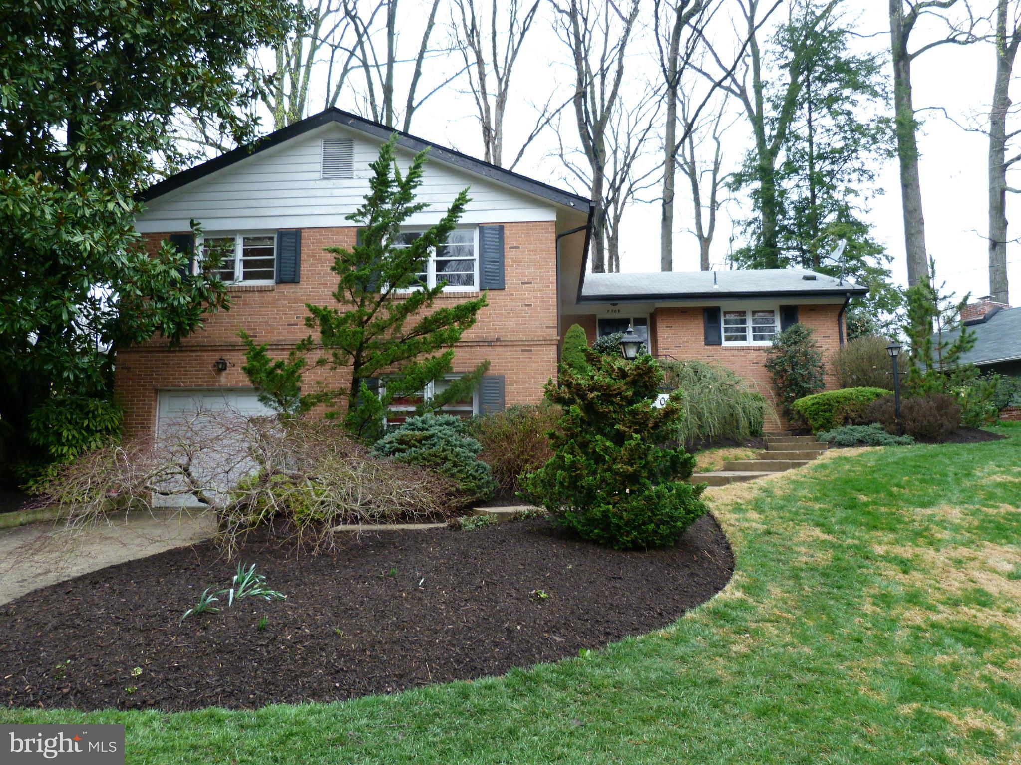 9508 Midwood Road Silver Spring, MD 20910 - Photo 1 of 10 front view of a house with a yard