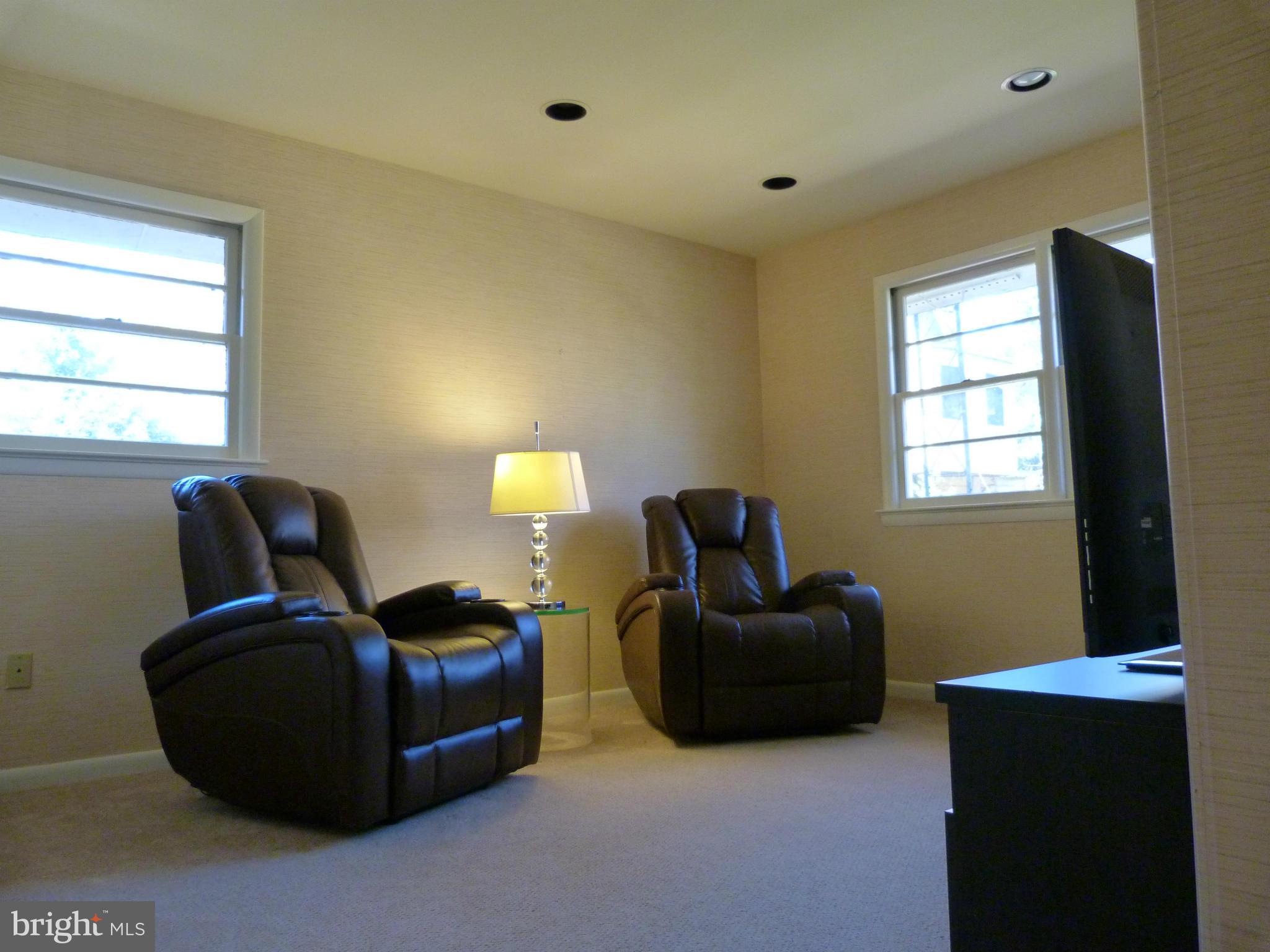 9508 Midwood Road Silver Spring, MD 20910 - Photo 8 of 10 a living room with furniture and a window
