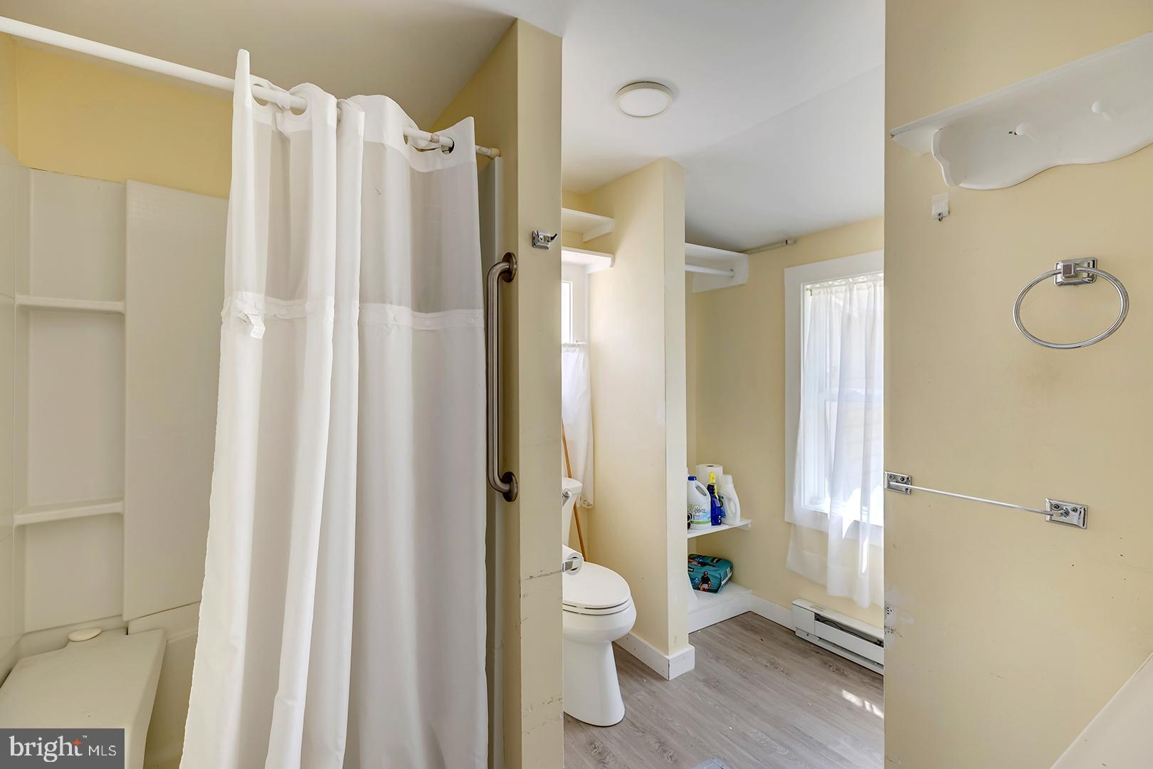29092 Piney Neck Road Dagsboro, DE 19939 - Photo 14 of 49 a bathroom with a shower toilet and a shower