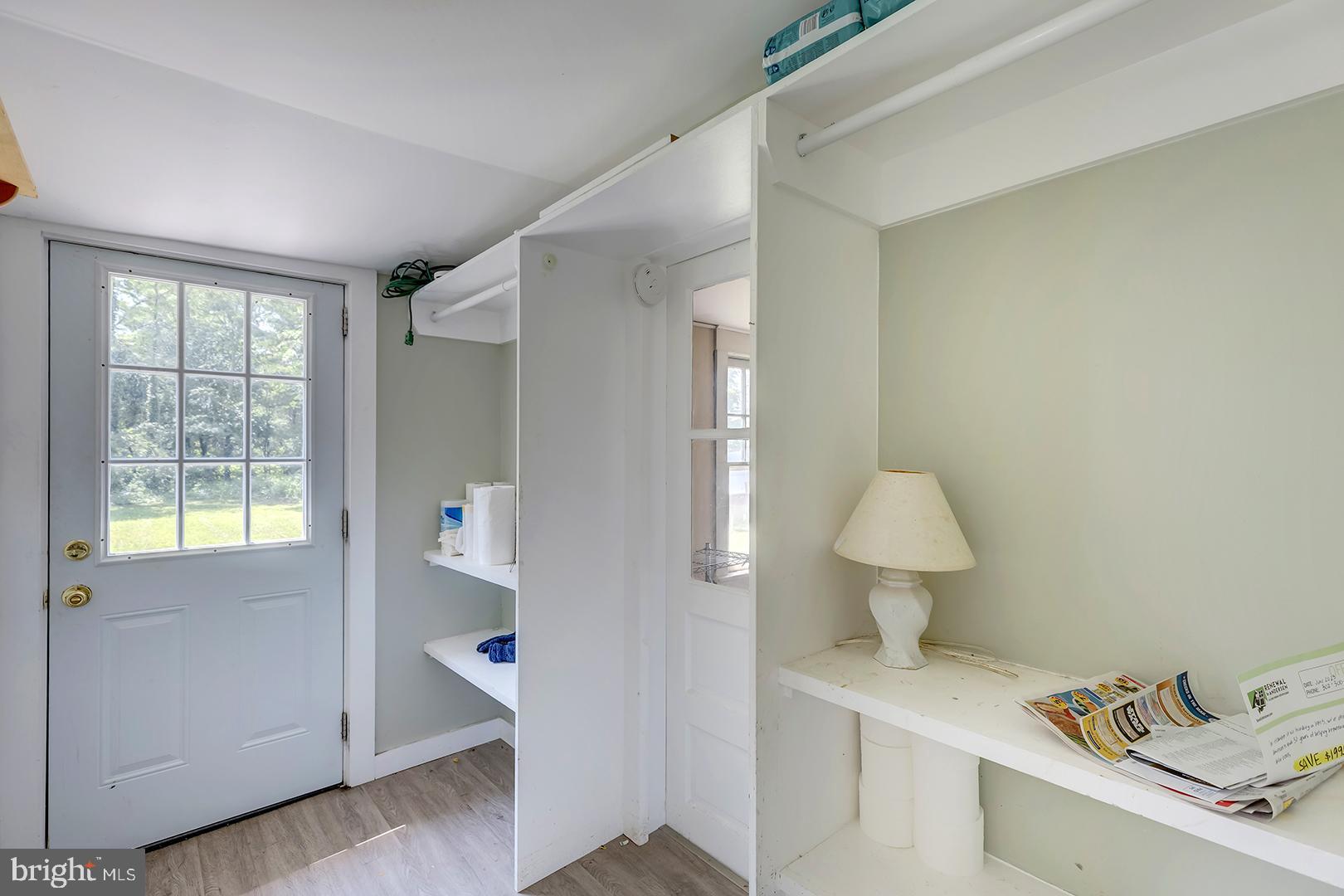 29092 Piney Neck Road Dagsboro, DE 19939 - Photo 16 of 49 a view of kitchen with furniture and wooden floor