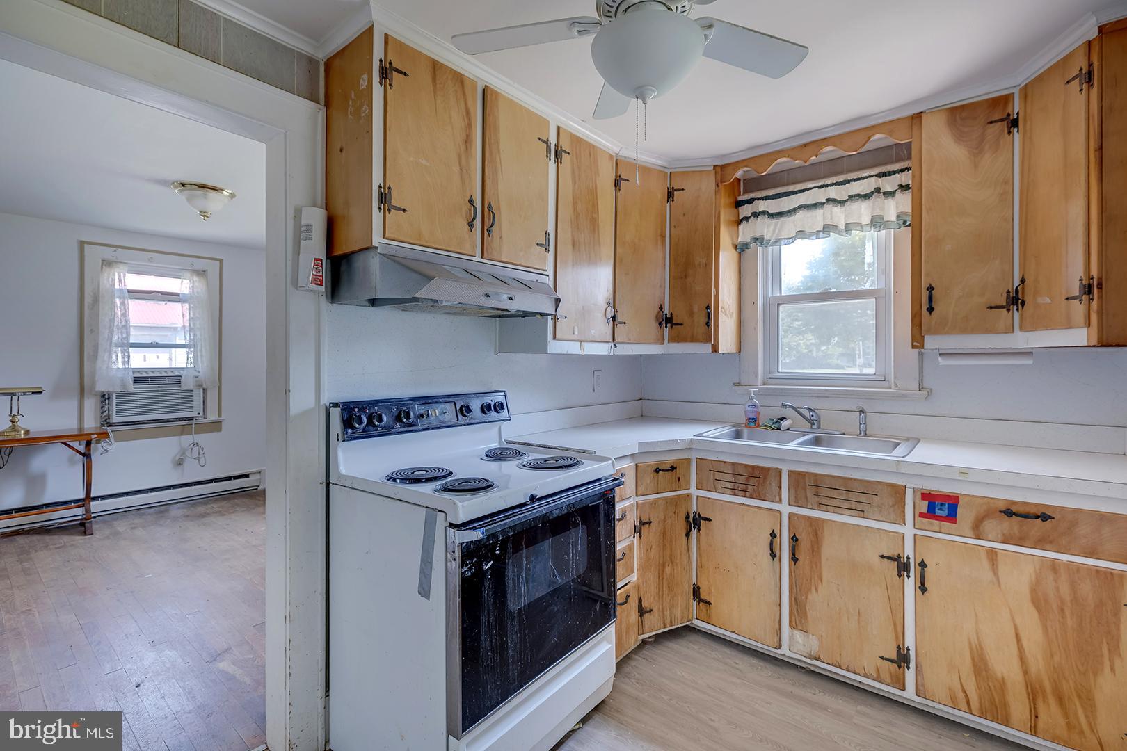 29092 Piney Neck Road Dagsboro, DE 19939 - Photo 17 of 49 a view of a kitchen with electric appliances