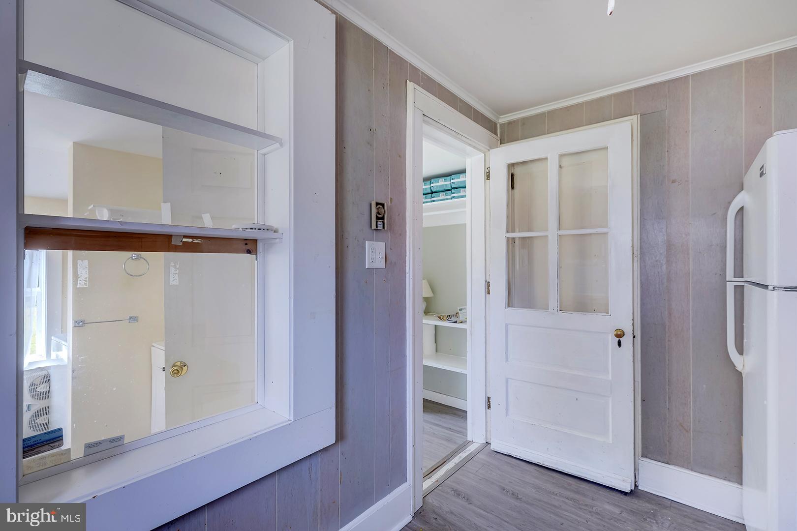 29092 Piney Neck Road Dagsboro, DE 19939 - Photo 18 of 49 wooden floor with white walls