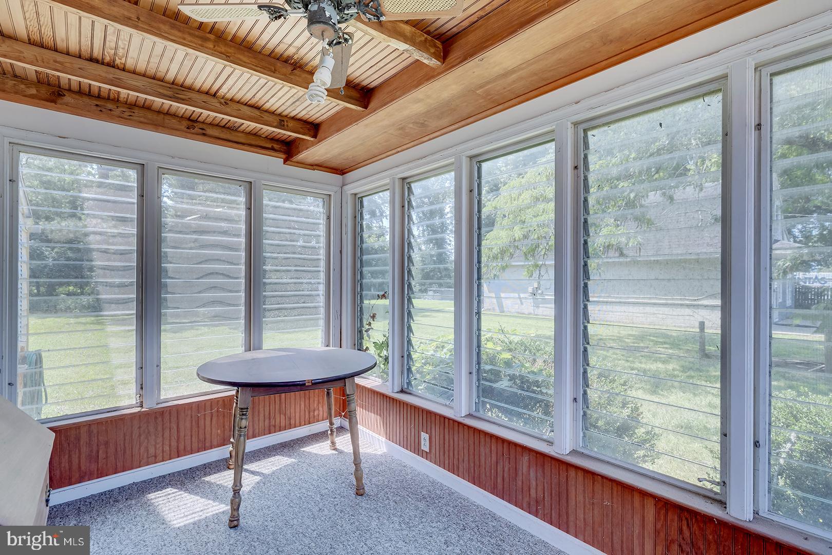 29092 Piney Neck Road Dagsboro, DE 19939 - Photo 21 of 49 a living room with furniture and a window
