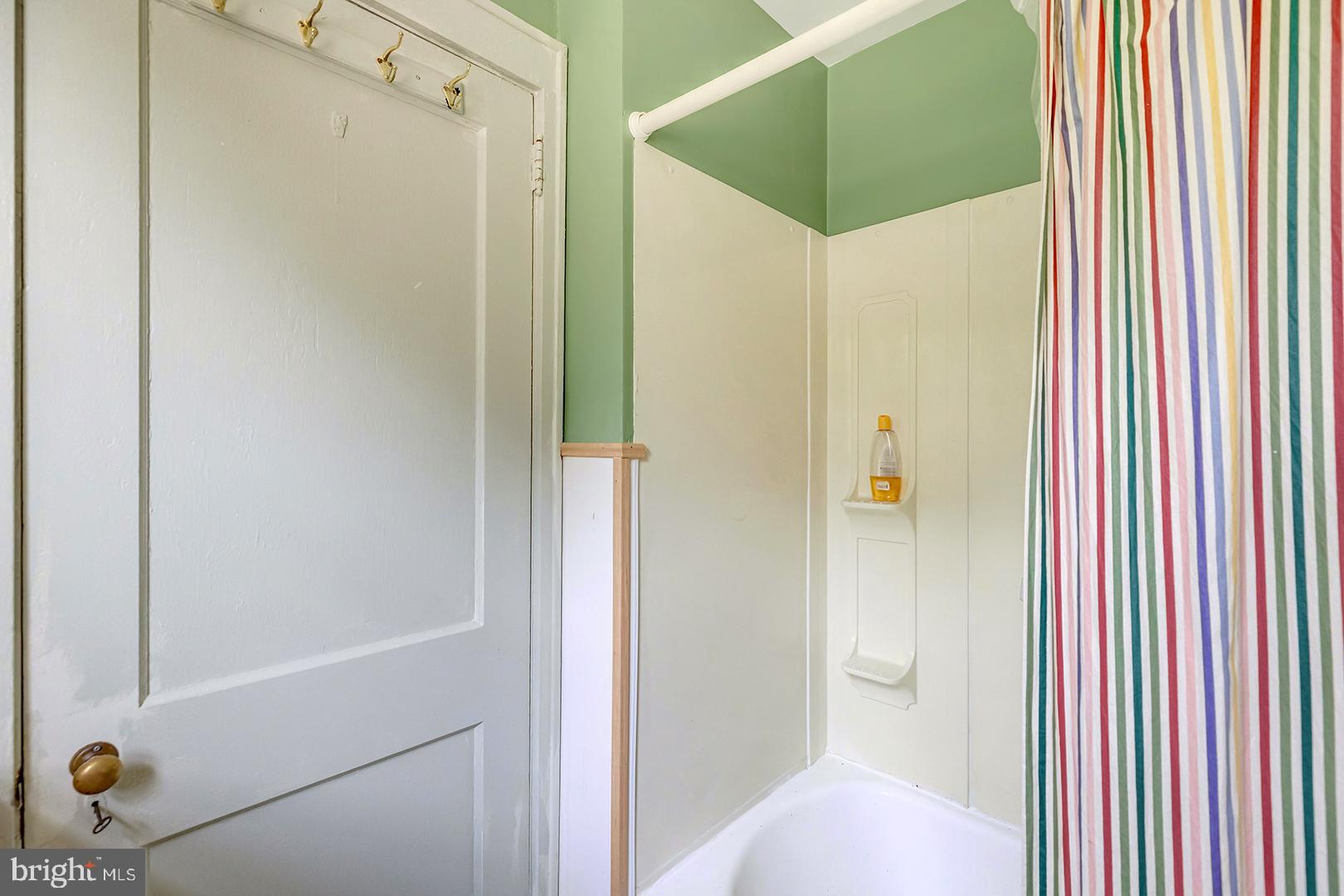 29092 Piney Neck Road Dagsboro, DE 19939 - Photo 25 of 49 a bathroom with a shower and a sink