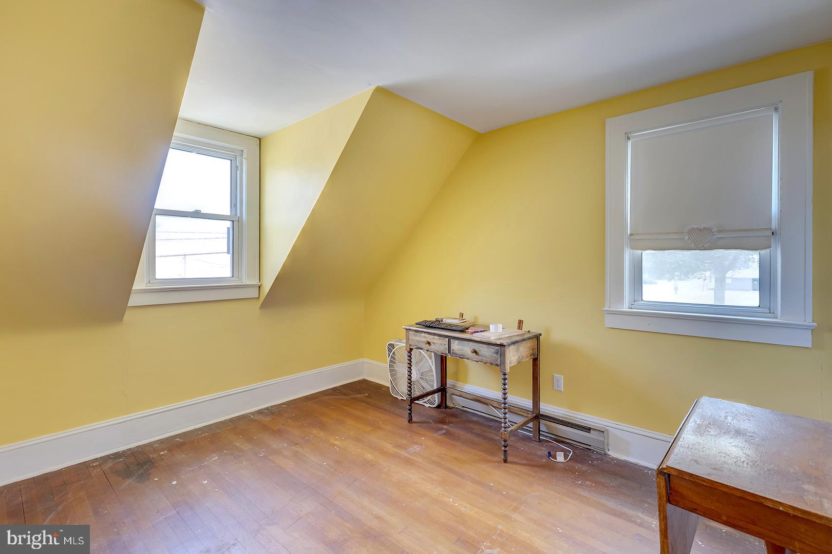 29092 Piney Neck Road Dagsboro, DE 19939 - Photo 29 of 49 a workspace room with wooden floor and windows