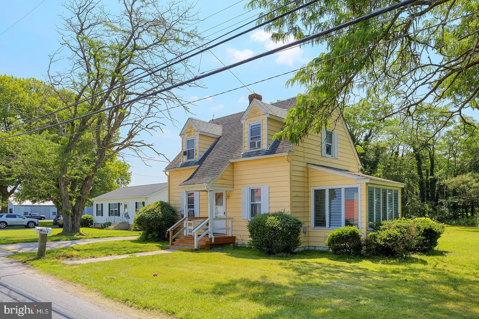 29092 Piney Neck Road Dagsboro, DE 19939 - Photo 3 of 49 a view of a house with a swimming pool