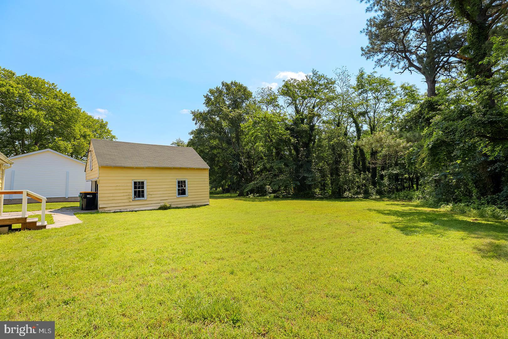 29092 Piney Neck Road Dagsboro, DE 19939 - Photo 33 of 49 a house with a trees in the background