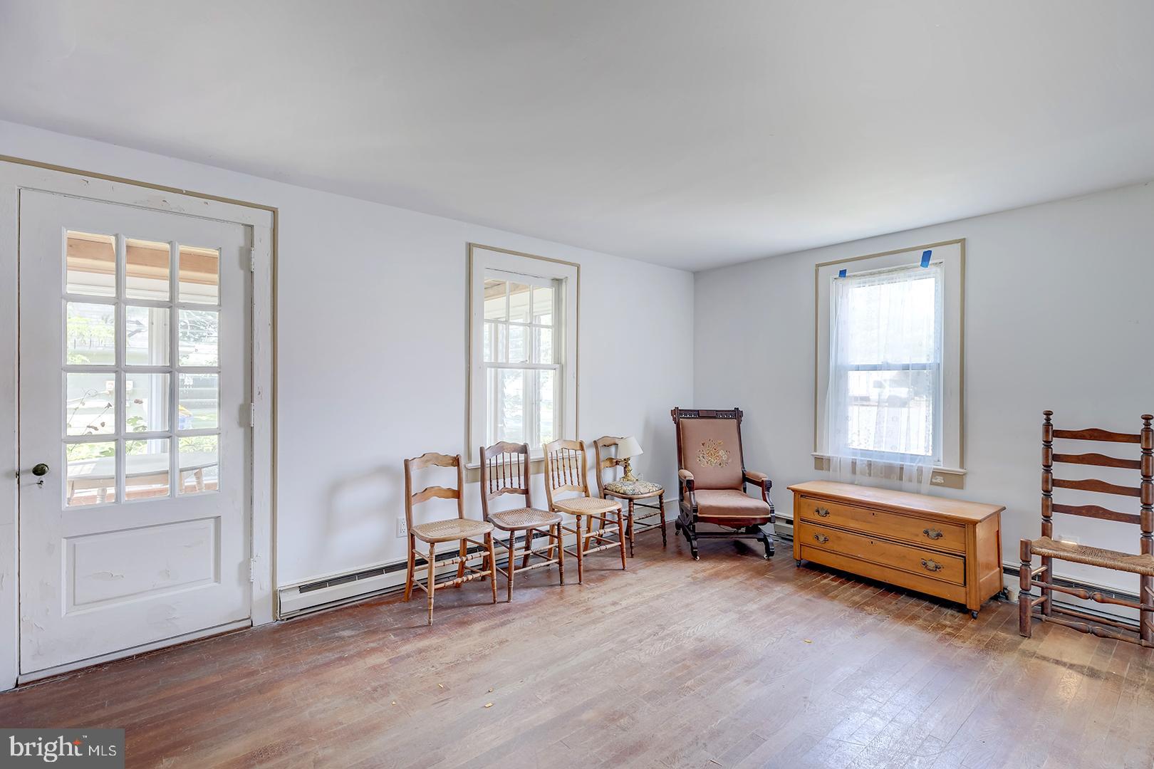 29092 Piney Neck Road Dagsboro, DE 19939 - Photo 7 of 49 a living room with furniture and a window